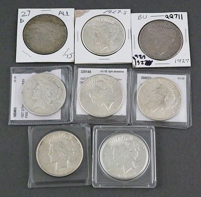 (8) 1927 Peace Silver Dollars. Eight 1927 silver Peace dollars. Three mint marked D and two 