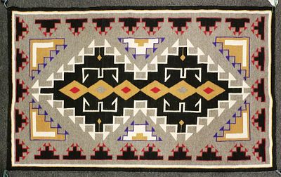 Teec Nos Pos Navajo Rug by Ruth Yabney. Handwoven wool rug by Navajo weaver Ruth Yabney in the 