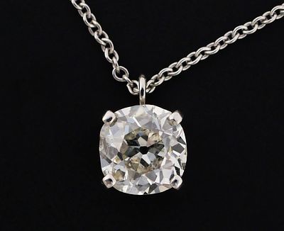 1.55 Carat Diamond Solitaire Necklace. Stunning antique cushion cut diamond, 1.55 carat, color 