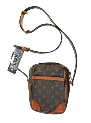 Louis Vuitton Monogram Danube Crossbody Bag. Measures approx 6-1/2" wide x 8-3/4" tall x 1-1/2" 