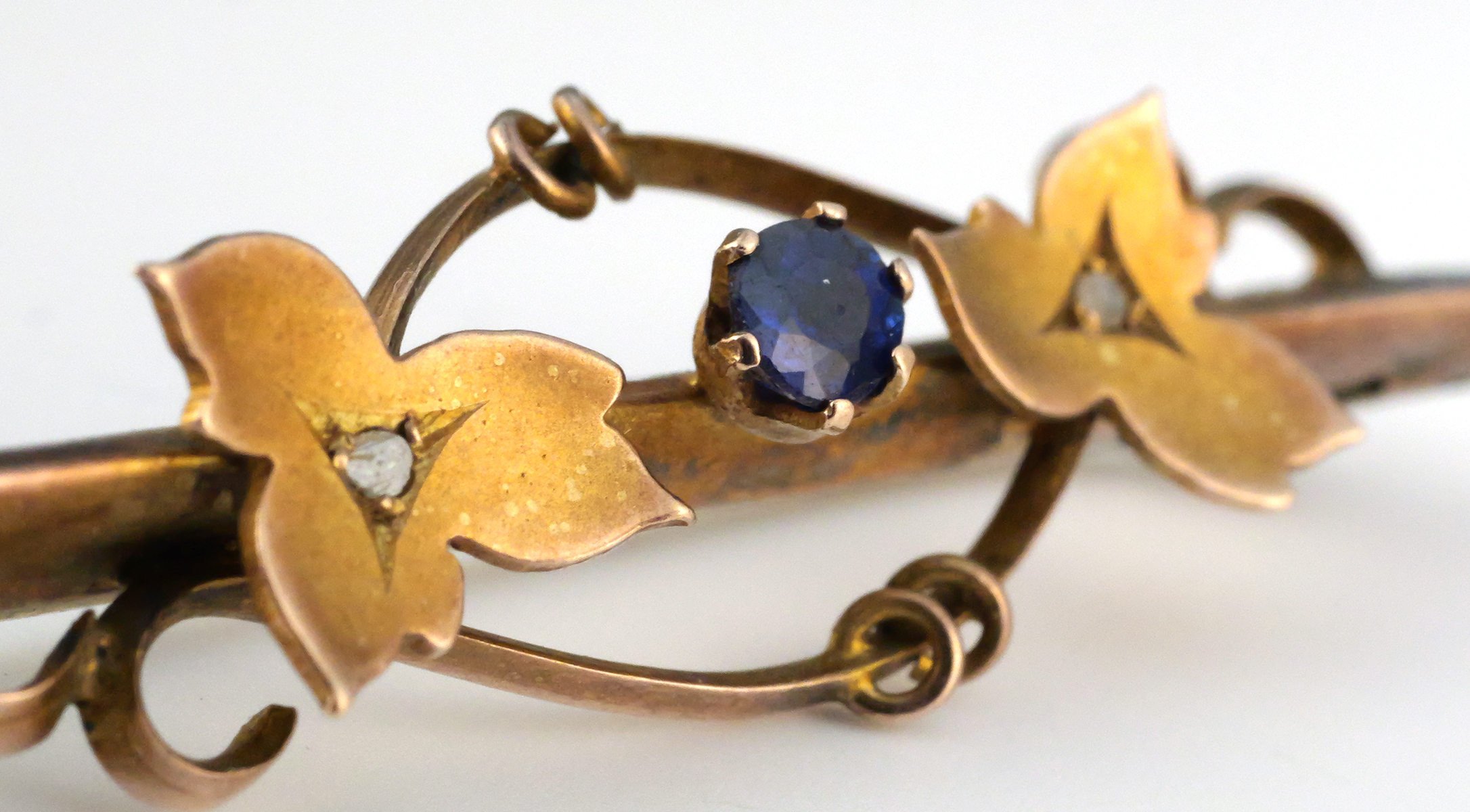 9K Gold Blue Tourmaline Floral Bar Brooch