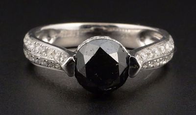 18K Gold Black Diamond Ring. Black Diamond is Round Brilliant Cut, color Fancy Black Irradiated 