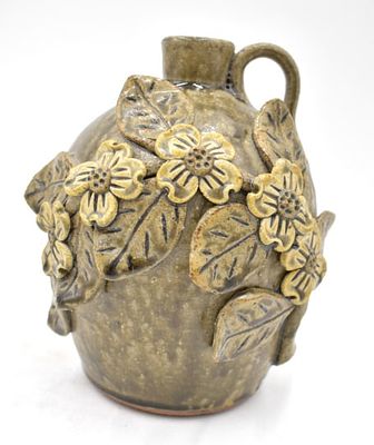 Michael and Pauline Crocker Dogwood Stoneware Jug. Applied decorative dogwood floral motif 