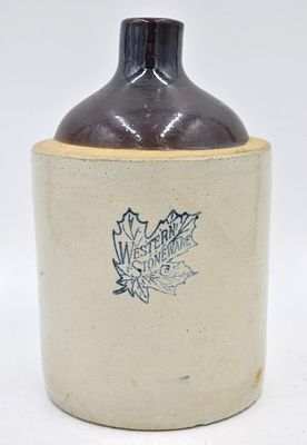 Western Stoneware Crock Jug. 9 inches by 6 inches, two toned, with blue embossed logo, no damage 