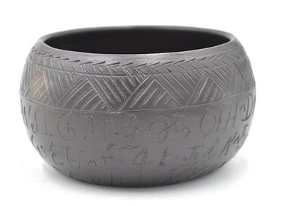 Louise Bigmeat Maney Blackware Cherokee Pottery. 2.75 inches by 4.75 inches, signed on the 