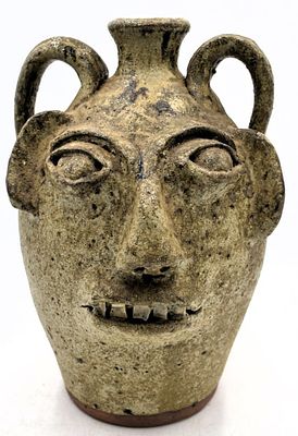 Burlon B. Craig Folk Art Pottery Face Jug. 12.75 inches by 9 inches, stamped on the bottom, no 