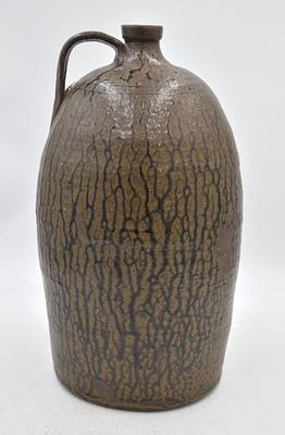 Southern Folk Tobacco Spit Brown Jug. 16.5 inches tall by 9 inches wide, unmarked tobacco spit 