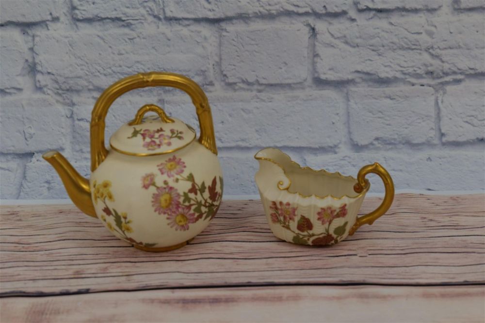 Lot 183: Royal Worcester Teapot with Creamer