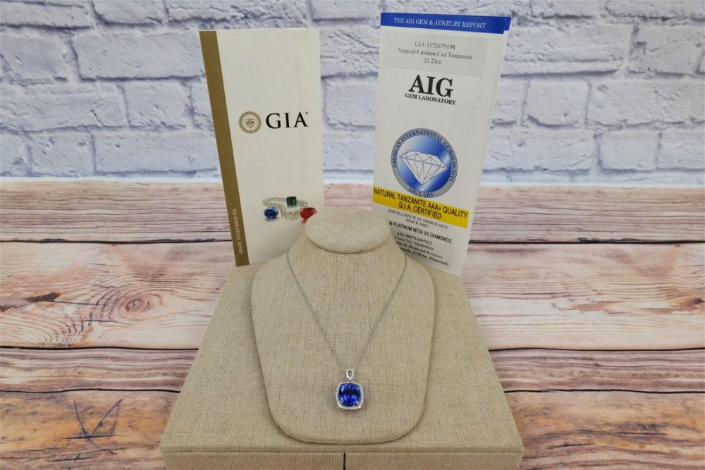 Lot 228: Platinum Tanzanite and Diamond Pendant with Chain