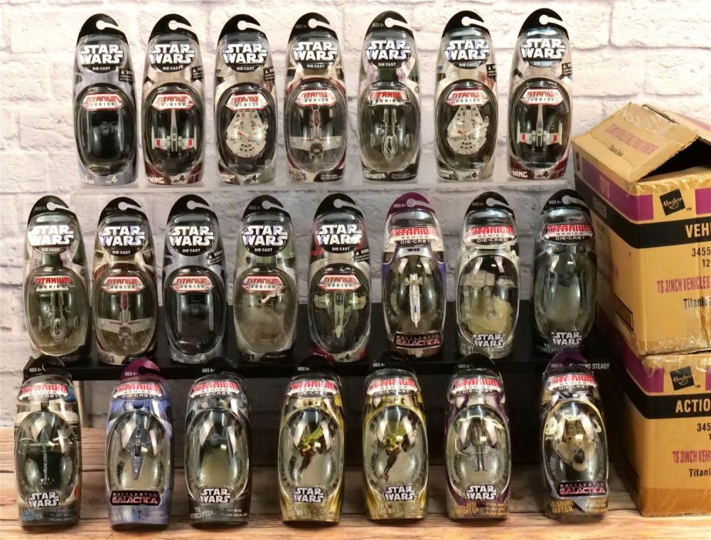 Lot 247: Two Cases of Star Wars Titanium 3" Vehicles - 22 Pcs