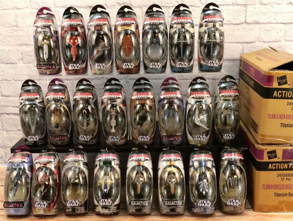Lot 253: Two Cases of Star Wars Titanium 3" Vehicles - 23 Pcs
