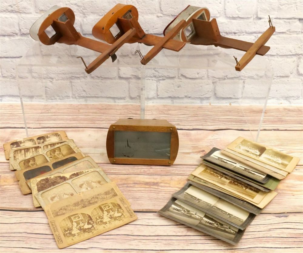 Lot 176: Lot of Handheld Stereo Viewers and Cards