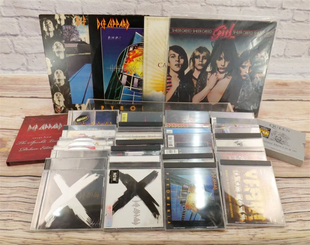 Lot 281: Lot of Rock and Roll CD's and Vinyl