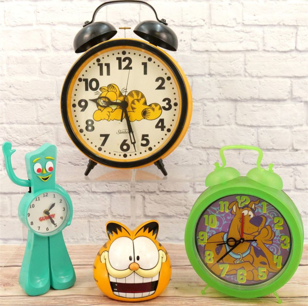 Lot 195: Lot of 4 Novelty Clocks