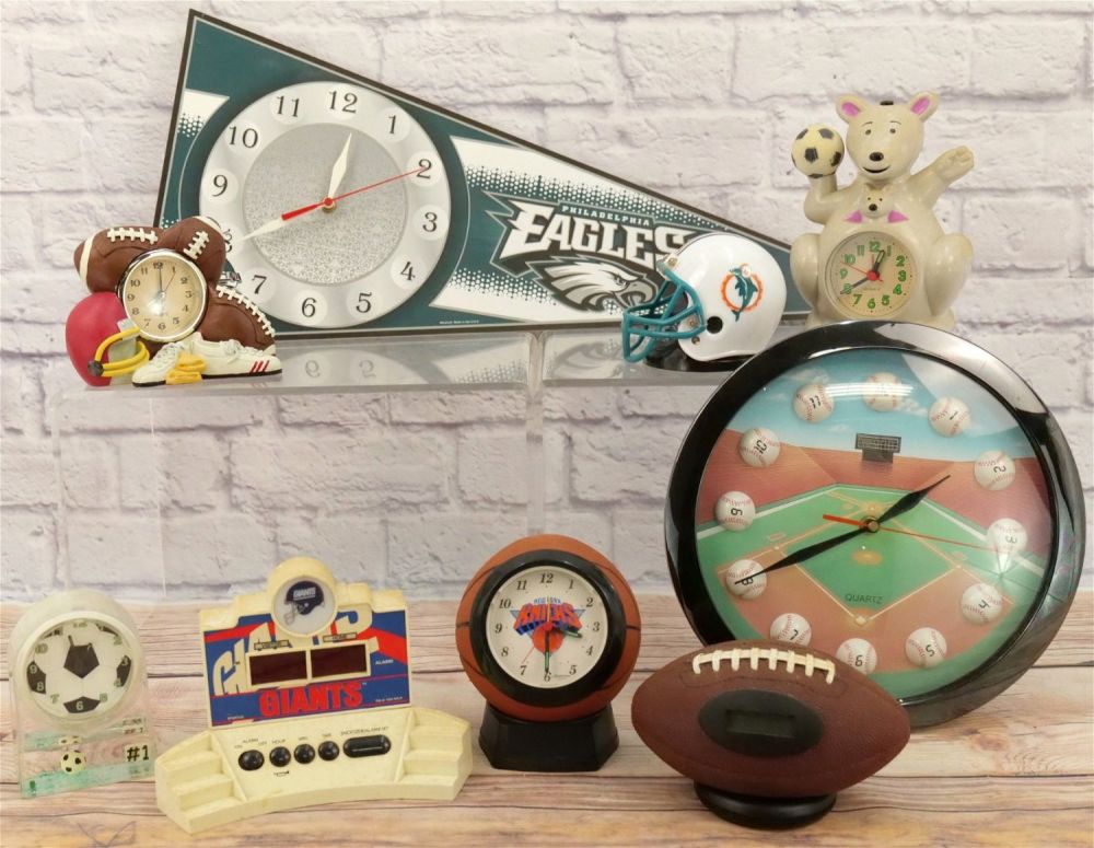 Lot 199: Lot of 9 Sports Themed Novelty Clocks