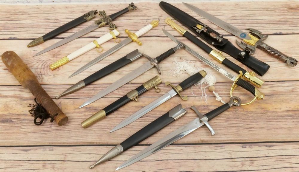 Lot 228: Lot of Fantasy Knives, Swords and Weapons
