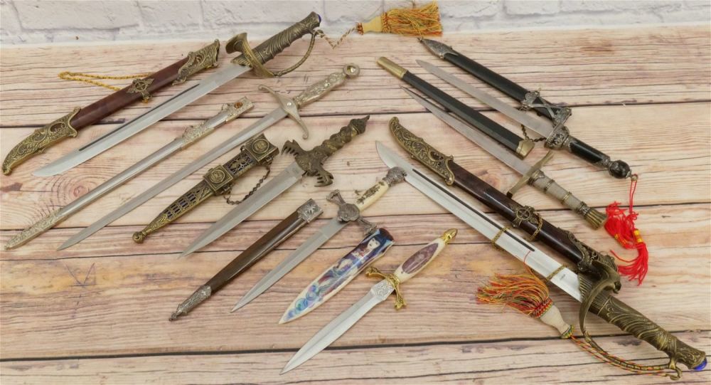 Lot 229: Lot of Fantasy Knives and Swords