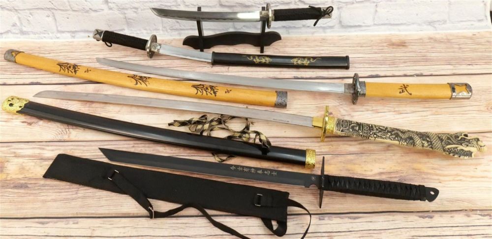 Lot 231: Lot of 4 Fantasy Swords