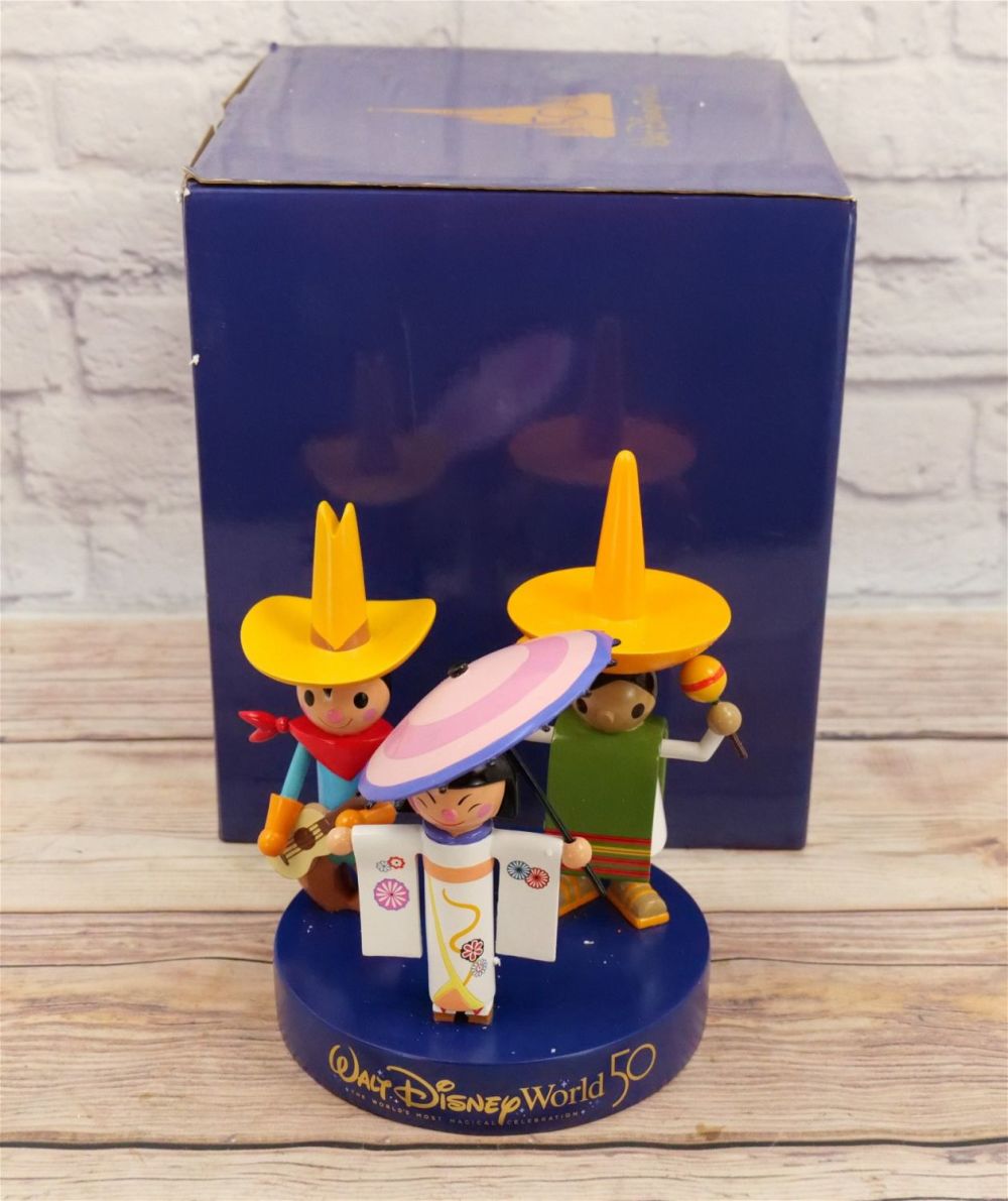 Lot 206: It's a Small World Attraction Musical Figurine
