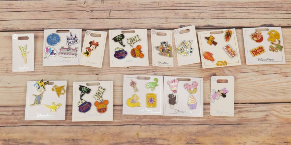Lot 265: Lot of 13 Disney Parks Pins and Sets