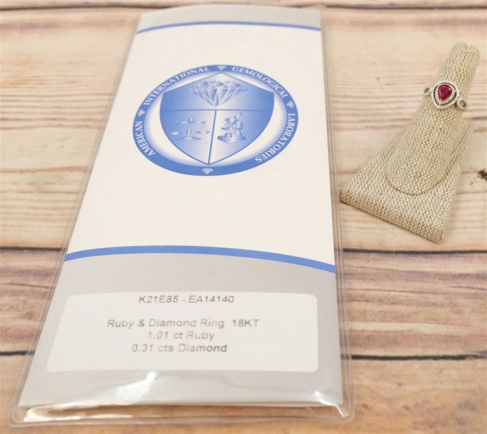 Lot 191: 18K Ruby & Diamond Ring