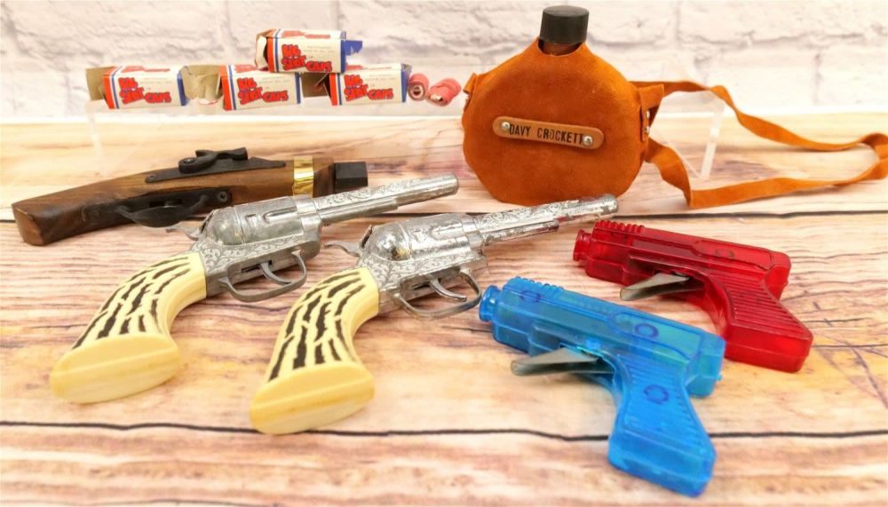 Lot 223: Lot of Toy Guns/Western Items