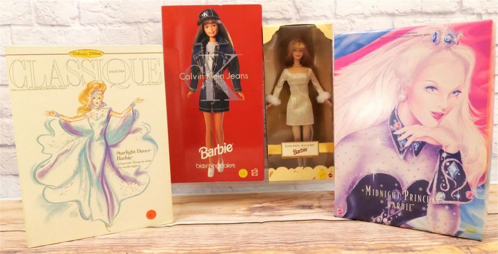 Lot 258: Lot of 4 Barbie Dolls