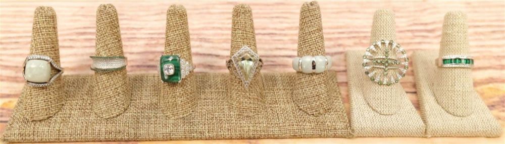 Lot 202: Lot of 7 Sterling Silver and Green Stone Rings