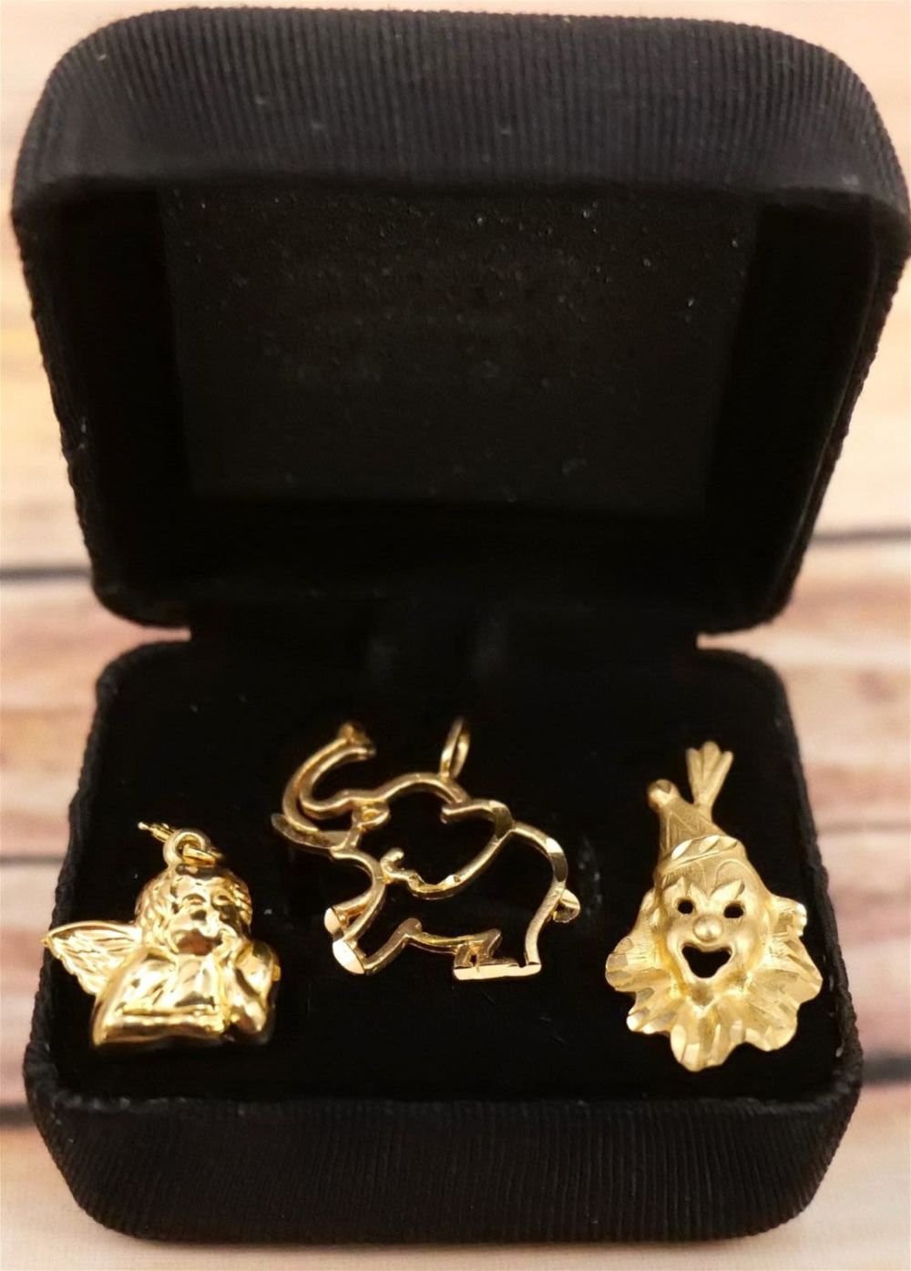 Lot 247: Lot of 3 14k Charms