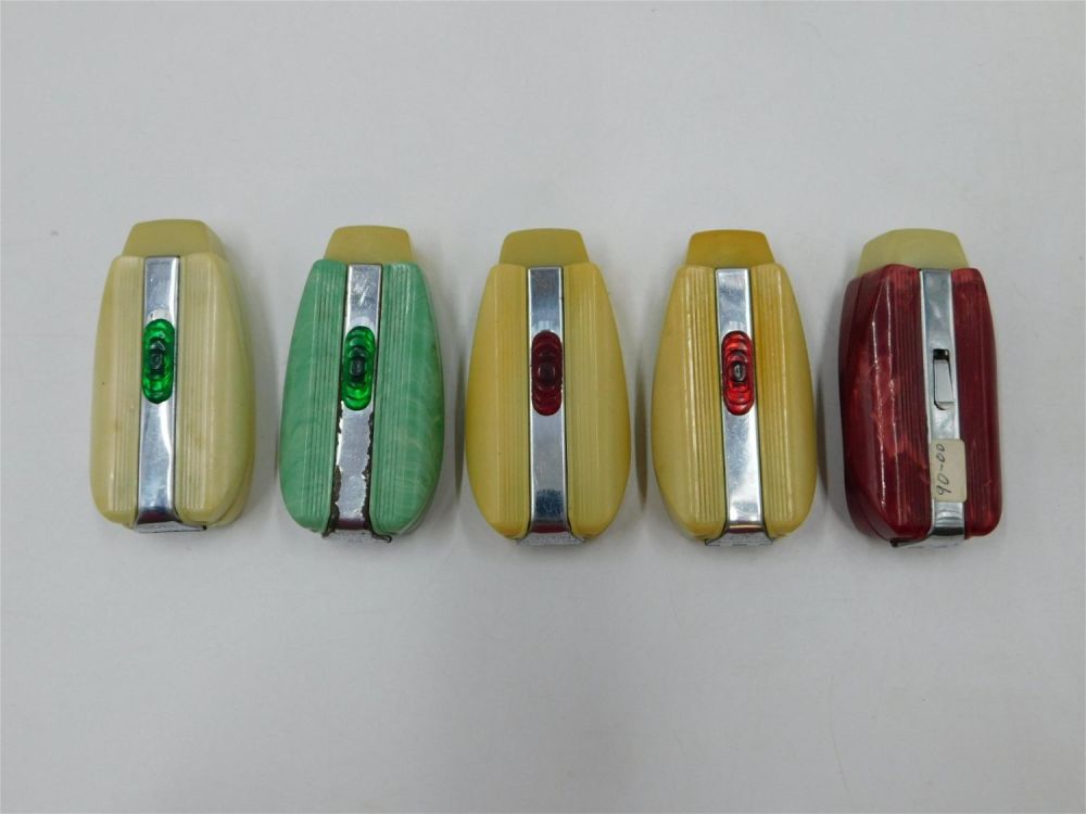 Lot 154: Lot of 5 USALite Art Deco Bakelite Vest Pocket Lights