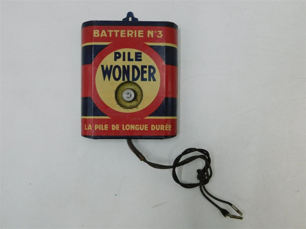 Lot 227: Vintage Tin Litho Wall Hanging Pile Wonder Tester