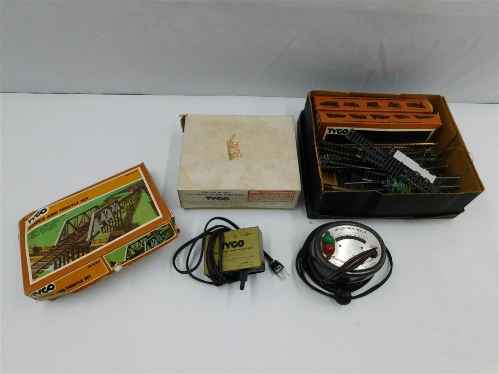 Lot 208: Lot of HO Train Track and Transformers