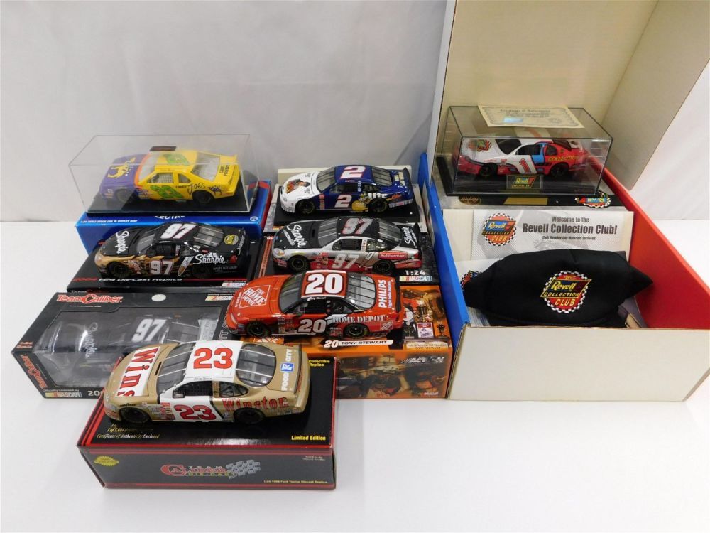 Lot 241: Lot of 8 Revell, Action and Team Caliber NASCAR 1:24 Scale Diecast