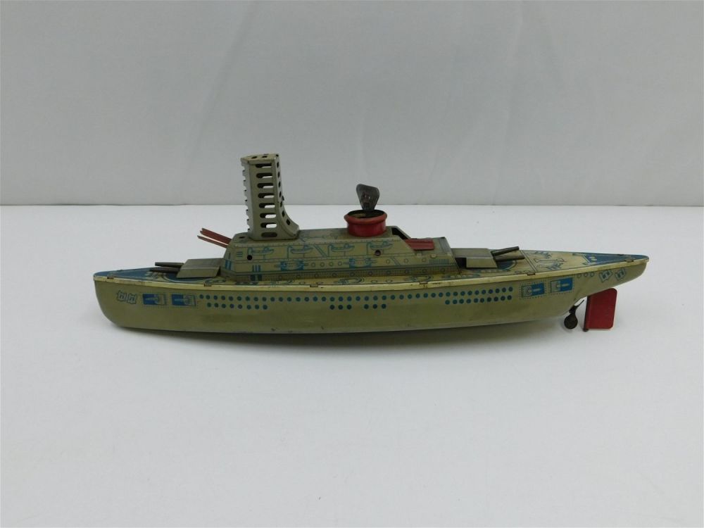 Lot 192: Vintage Tin Litho Key Wind Battleship Toy Boat