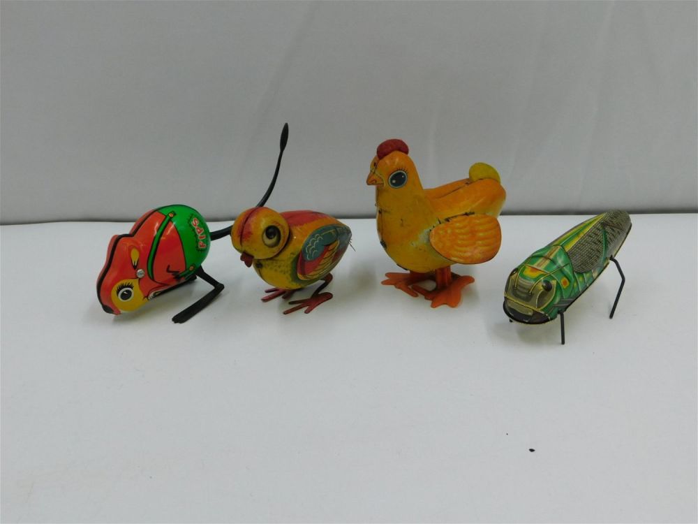 Lot 208: Lot of 4 Tin Litho Wind Up Toys