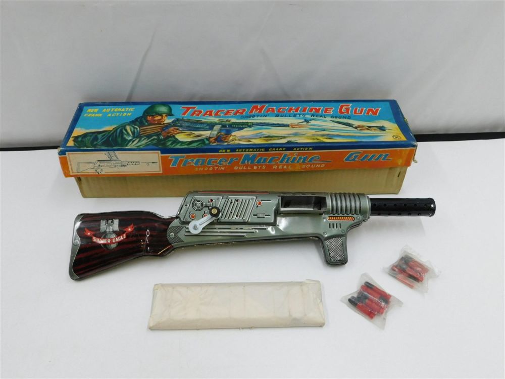 Lot 211: Vintage Tin Litho Tracer Machine Gun