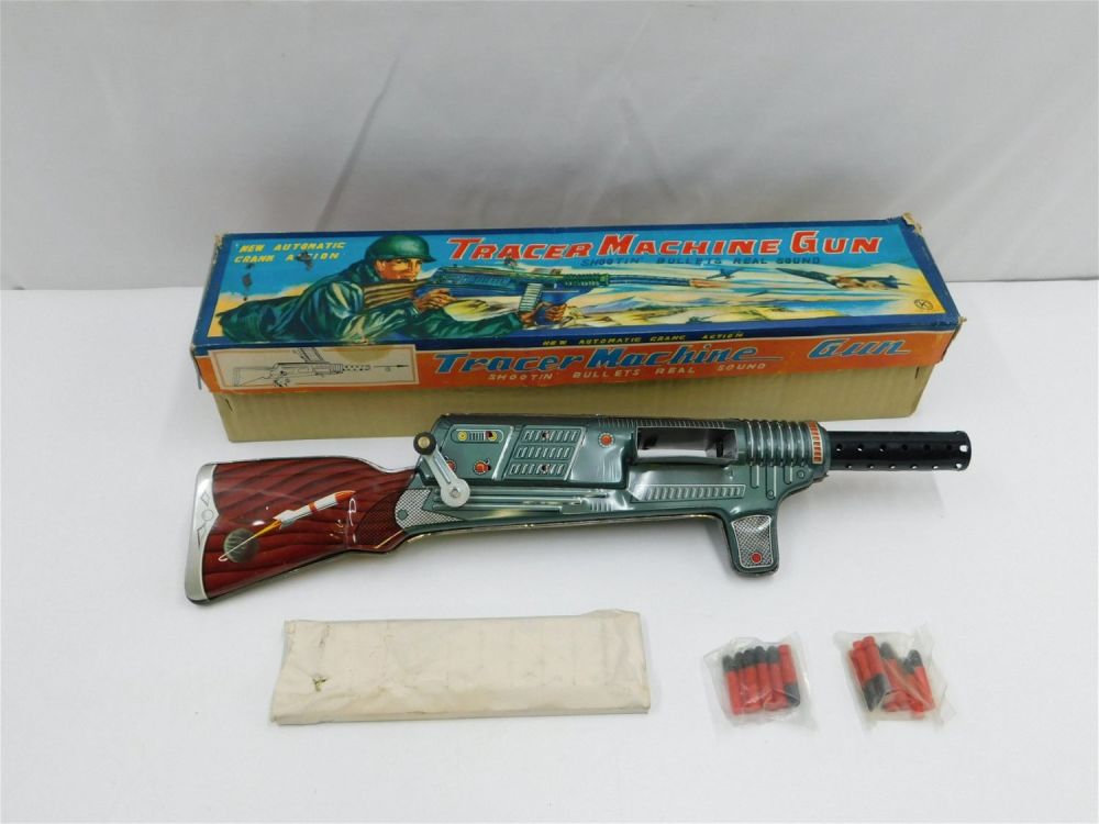Lot 212: Vintage Tin Litho Tracer Machine Gun