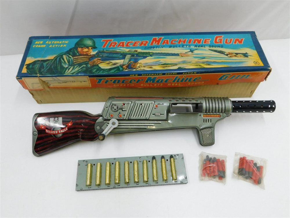 Lot 213: Vintage Tin Litho Tracer Machine Gun