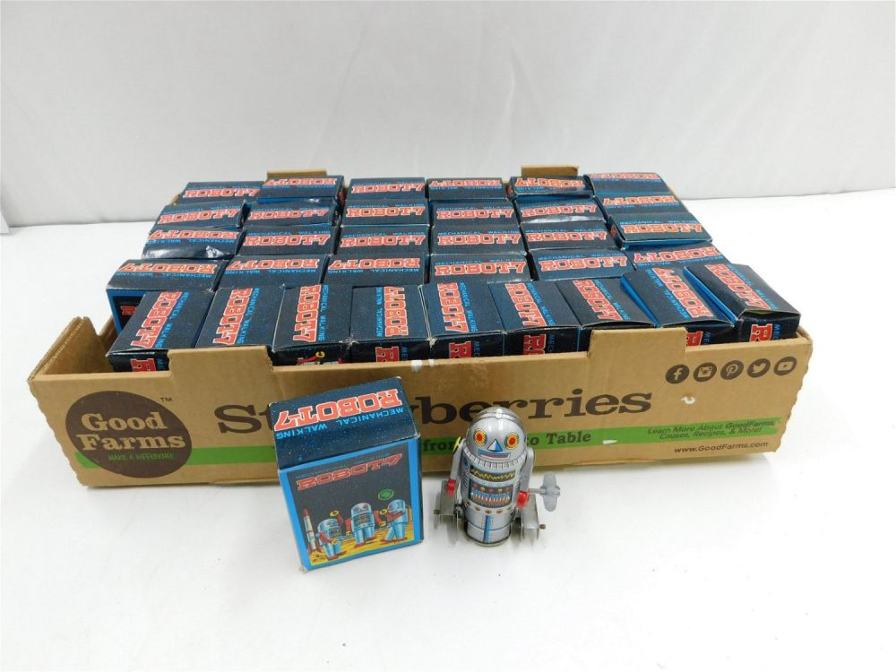 Lot 246: Lot of 34 Mechanical Walking Robot-7 Tin Toys