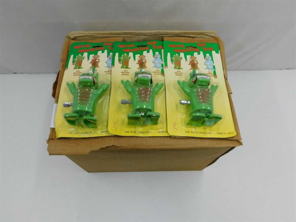 Lot 251: Full Case of Wind Up Walking Monster Toys