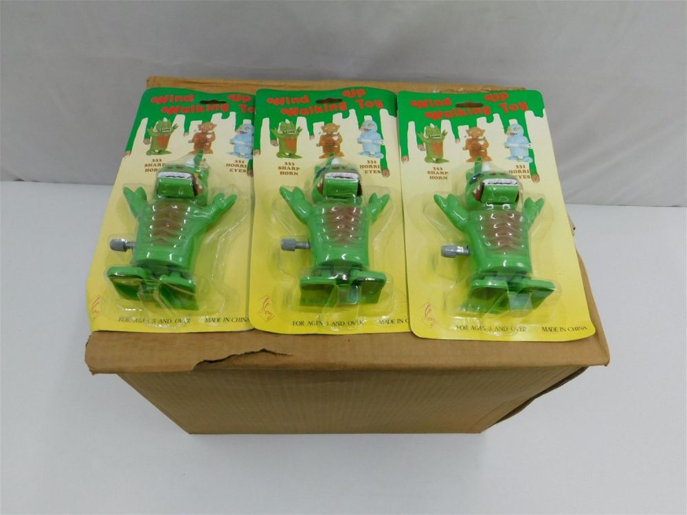 Lot 252: Full Case of Wind Up Walking Monster Toys