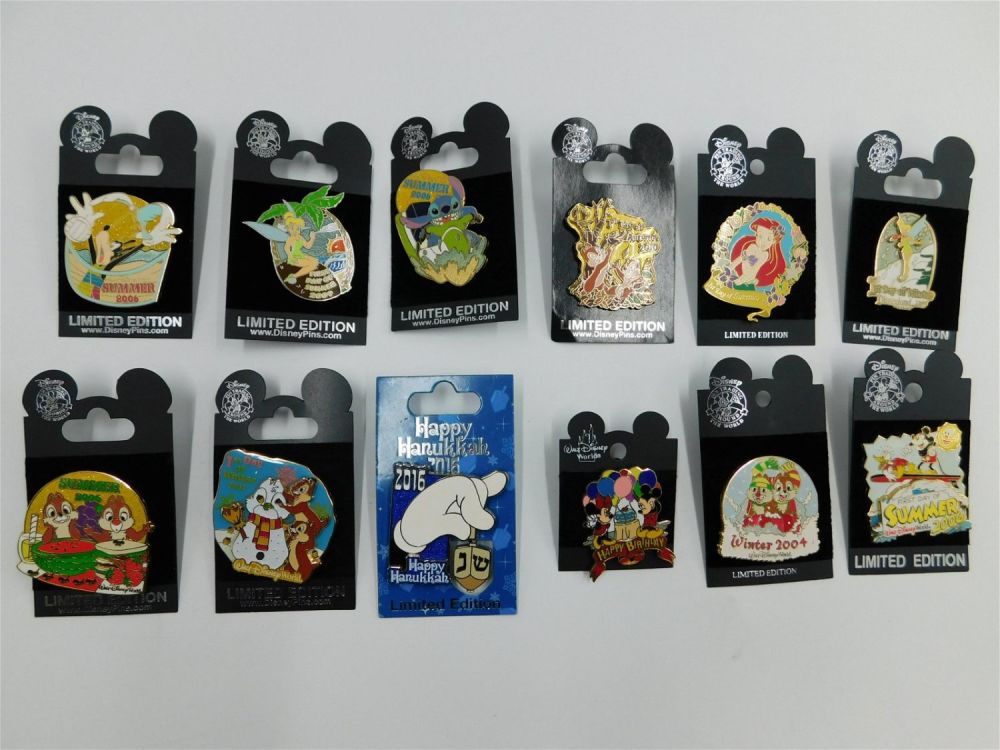 Lot 153: Lot of 12 Disney Celebration Pins