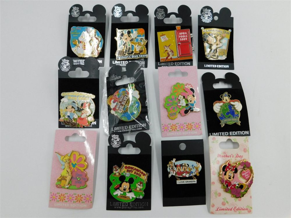 Lot 154: Lot of 12 Mixed Disney Holiday/Celebration Pins