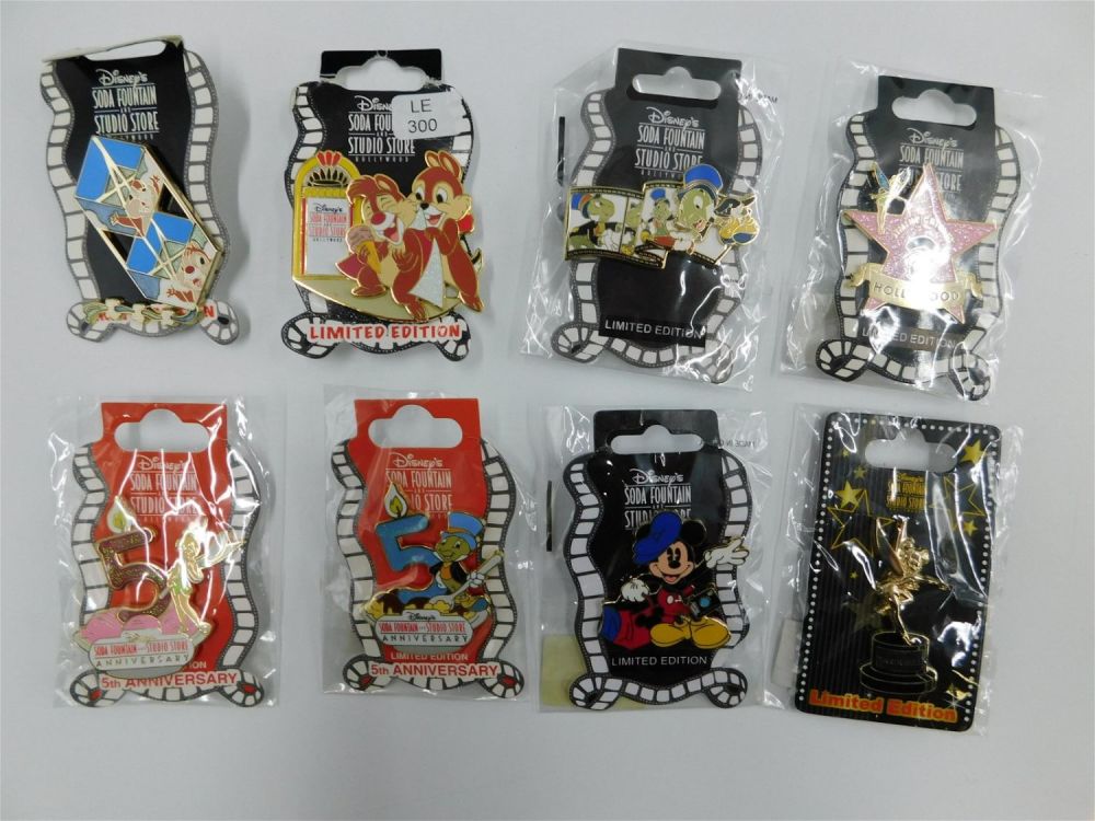Lot 173: Lot of 8 Limited Edition Disney Soda Fountain and Studio Store Pins