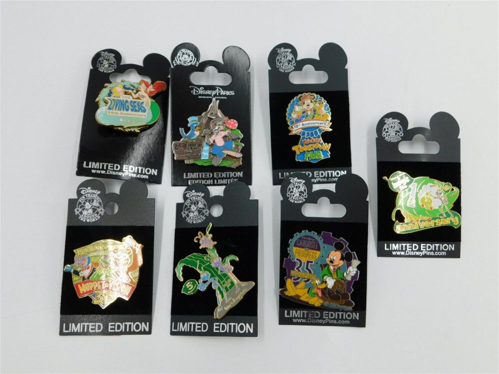 Lot 188: Lot of 7 Attraction Anniversary Limited Edition Pins