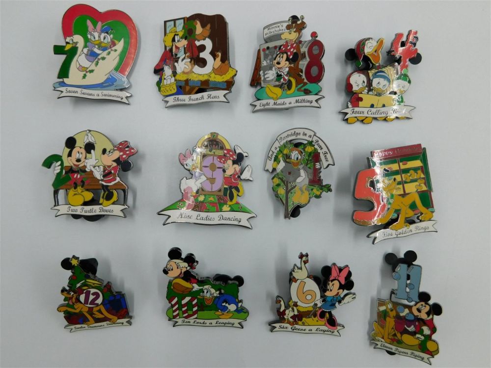 Lot 260: Twelve Days of Christmas Disney Pin Set - Complete