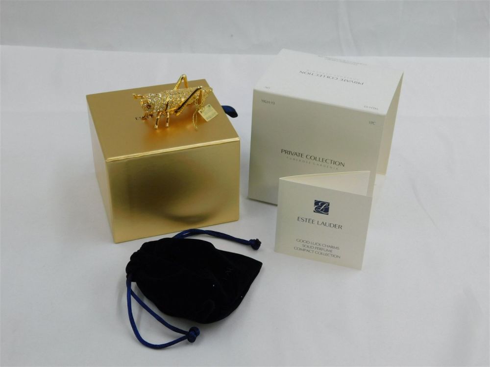 Lot 212: Estee Lauder Glittering Cricket Perfume Compact