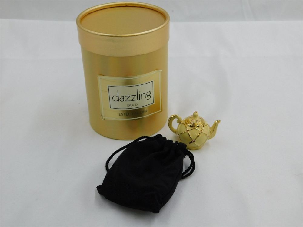 Lot 221: Estee Lauder Teapot Perfume Compact