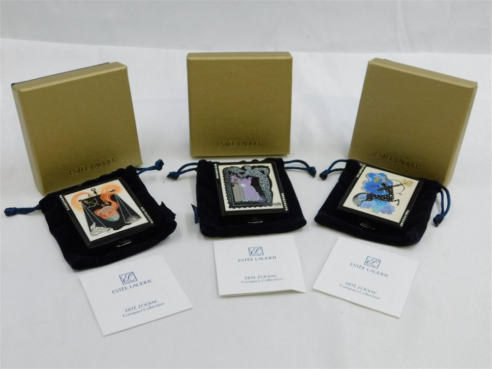 Lot 231: Lot of 3 Estee Lauder Erte Zodiac Compacts