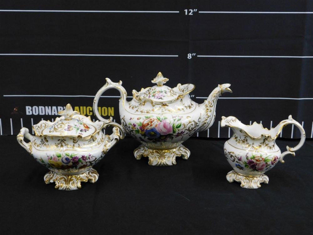Lot 184: Hand Painted Porcelain Teapot, Creamer and Sugar
